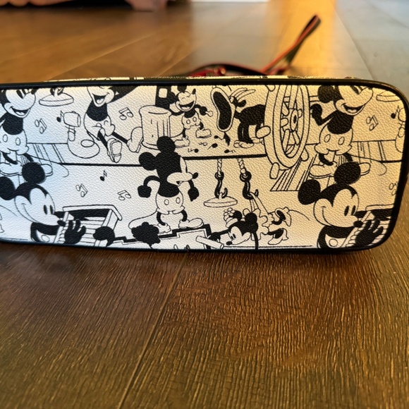 Dooney & Bourne Steamboat Willie Sling Bag - Picture 7 of 7